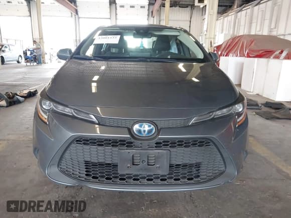 ✅ 2022 Toyota Corolla Hybrid LE • VIN: JTDEAMDE5N3011629 • Lot: 43001535. Listed on IAAI with 34,385 mi. Free auction sales archive from the USA and detailed vehicle history report at DreamBid. Image 12.