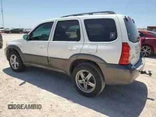 ✅ 2006 Mazda Tribute S • VIN: 4F2YZ04166KM12531 • Лот: 63354374. Опубликован ранее на Copart с пробегом 196 753 миль. Бесплатный доступ к архиву аукционных продаж из США и подробный отчёт об истории автомобиля на DreamBid. Изображение 2.