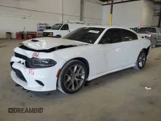 2023 Dodge Charger GT с VIN 2C3CDXHG2PH626493, выставлен на аукционе Copart как лот 81412365 с пробегом 56 232 миль миль и Списание • Salvage title. История ставок и продаж доступна на DreamBid. Изображение 1.