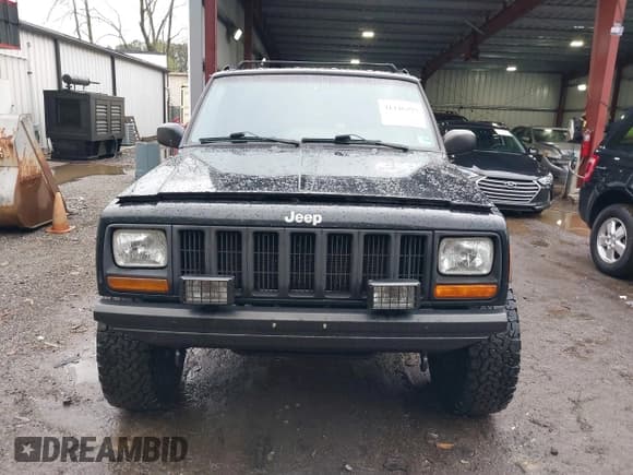 ✅ 1998 Jeep Cherokee Sport • VIN: 1J4FJ68S1WL266581 • Lot: 41446293. Listed on IAAI with 149,202 mi. Free auction sales archive from the USA and detailed vehicle history report at DreamBid. Image 12.
