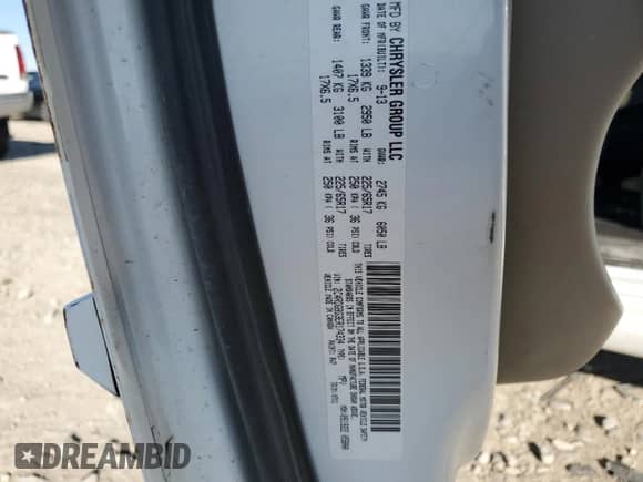 2014 Dodge Grand Caravan SE with VIN 2C4RDGBG3ER174334, listed as a Copart auction lot 90400355 with 209,004 mi miles and Clean title. Bid and sale history available at DreamBid. Image 12.