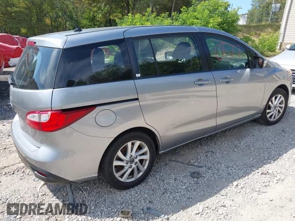 ✅ 2014 Mazda 5 Sport • VIN: JM1CW2BL1E0170504 • Лот: 43190577. Опубликован ранее на IAAI с пробегом 112 912 миль. Бесплатный доступ к архиву аукционных продаж из США и подробный отчёт об истории автомобиля на DreamBid. Изображение 4.