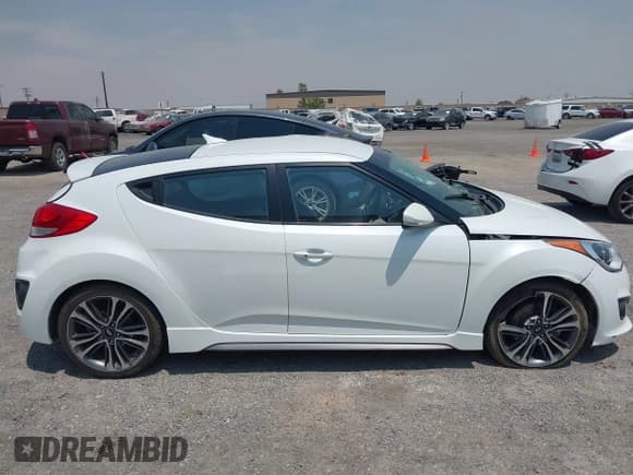 ✅ 2016 Hyundai Veloster Turbo R-Spec • VIN: KMHTC6AE5GU263570 • Lot: 42897746. Wystawiony na IAAI z przebiegiem 68 200 mil. Bezpłatny archiwum sprzedaży aukcyjnych z USA i szczegółowy raport historii pojazdu na DreamBid. Zdjęcie 13.