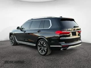 ✅ 2019 BMW X7 xDrive50i • VIN: 5UXCX4C58KLS38928 • Лот: 93027945. Опубликован ранее на Copart с пробегом 98 606 миль. Бесплатный доступ к архиву аукционных продаж из США и подробный отчёт об истории автомобиля на DreamBid. Изображение 3.