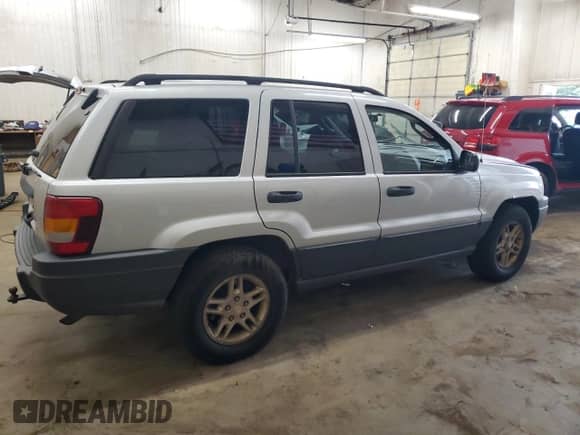 2004 Jeep Grand Cherokee Laredo с VIN 1J4GW48S04C312361, выставлен на аукционе Copart как лот 81420765 с пробегом 131 405 миль миль и Списание • Salvage title. История ставок и продаж доступна на DreamBid. Изображение 3.