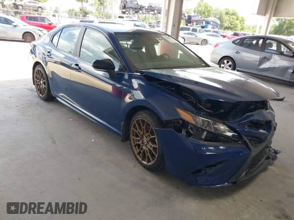 2023 Toyota Camry SE with VIN 4T1G11BK9PU091896, listed as a IAAI auction lot 42505987 with 75,683 mi miles and . Bid and sale history available at DreamBid. Image 1.