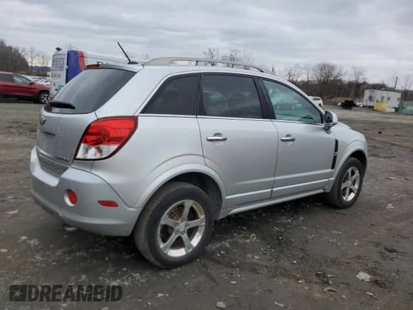 2012 Chevrolet Captiva Sport LTZ с VIN 3GNFL4E58CS625456, выставлен на аукционе Copart как лот 87071204 с пробегом 115 674 миль миль и Списание • Salvage title. История ставок и продаж доступна на DreamBid. Изображение 3.