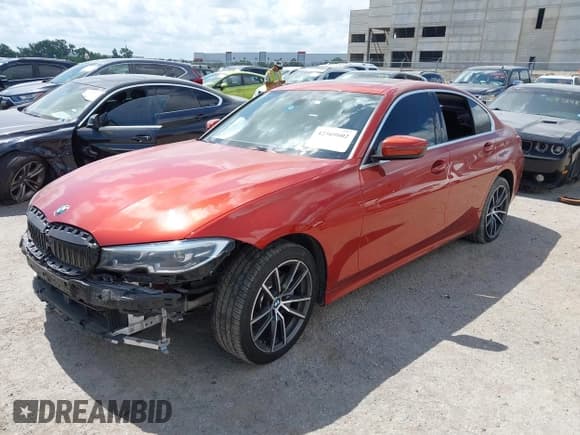 ✅ 2021 BMW 3 Series 330i xDrive • VIN: 3MW5R7J01M8B77667 • Lot: 42569602. Listed on IAAI with 61,457 mi. Free auction sales archive from the USA and detailed vehicle history report at DreamBid. Image 2.