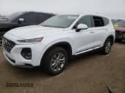 ✅ 2019 Hyundai Santa Fe SE • VIN: 5NMS23AD0KH122169 • Lot: 71083432. Wystawiony na Copart z przebiegiem 52 559 mil. Bezpłatny archiwum sprzedaży aukcyjnych z USA i szczegółowy raport historii pojazdu na DreamBid. Zdjęcie 1.