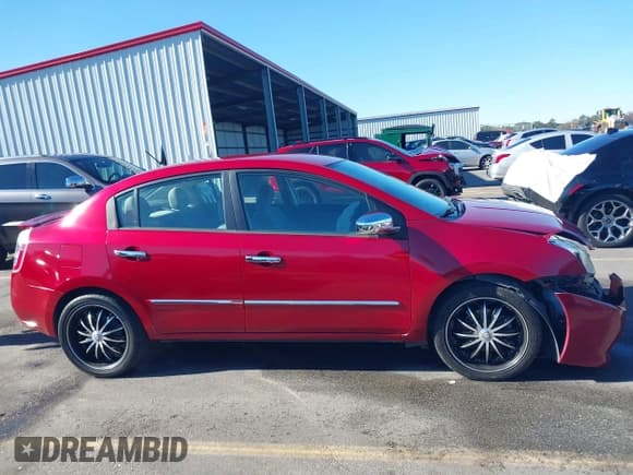 ✅ 2012 Nissan Sentra SR • VIN: 3N1AB6AP6CL651723 • Lot: 43660240. Listed on IAAI with 169,288 mi. Free auction sales archive from the USA and detailed vehicle history report at DreamBid. Image 13.