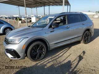 ✅ 2023 Volkswagen Tiguan SE R-Line Black • VIN: 3VVCB7AX7PM142060 • Lot: 87313265. Listed on Copart with 19,857 mi. Free auction sales archive from the USA and detailed vehicle history report at DreamBid. Image 1.