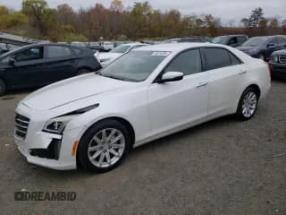 ✅ 2015 Cadillac CTS Luxury AWD • VIN: 1G6AX5SX0F0116107 • Лот: 90515205. Опубликован ранее на Copart с пробегом 96 173 миль. Бесплатный доступ к архиву аукционных продаж из США и подробный отчёт об истории автомобиля на DreamBid. Изображение 1.