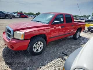 2007 Dodge Dakota SLT z VIN 1D7HE48K37S173310, wystawiony jako Copart lot #64116395 z przebiegiem 195 951 mil mil oraz Czysty tytuł • Clean title. Historia ofert i sprzedaży dostępna na DreamBid. Obrazek 1.