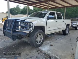 ✅ 2015 Chevrolet Silverado 1500 High Country • VIN: 3GCUKTEC2FG366336 • Лот: 61750615. Опубликован ранее на Copart с пробегом 159 834 миль. Бесплатный доступ к архиву аукционных продаж из США и подробный отчёт об истории автомобиля на DreamBid. Изображение 1.