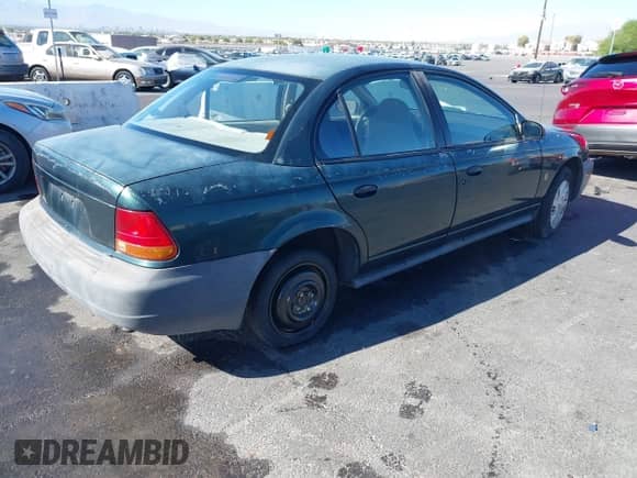 1996 Saturn SL с VIN 1G8ZG5283TZ360599, выставлен на аукционе IAAI как лот 43583109 с пробегом 206 429 миль миль и . История ставок и продаж доступна на DreamBid. Изображение 4.