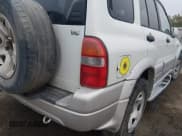 ✅ 2003 Suzuki Grand Vitara • VIN: JS3TE62VX34100454 • Lot: 43839370. Listed on IAAI with 198,777 mi. Free auction sales archive from the USA and detailed vehicle history report at DreamBid. Image 14.