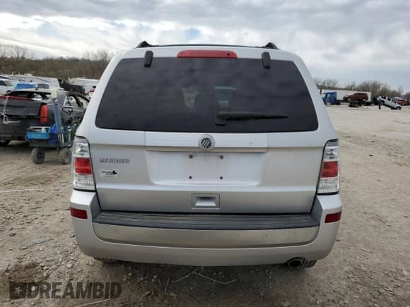 2011 Mercury Mariner z VIN 4M2CN8B73BKJ06886, wystawiony jako Copart lot #50308485 z przebiegiem 118 584 mil mil oraz Szkoda całkowita • Salvage title. Historia ofert i sprzedaży dostępna na DreamBid. Obrazek 6.