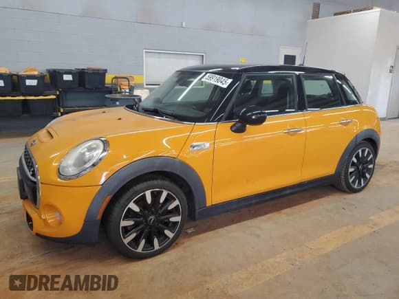 ✅ 2015 MINI Hardtop 4 Door S • VIN: WMWXU3C57F2B55735 • Lot: 59919045. Listed on Copart with 114,241 mi. Free auction sales archive from the USA and detailed vehicle history report at DreamBid. Image 1.