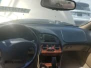 ✅ 1999 Chrysler Sebring LXi • VIN: 4C3AU52N1XE071836 • Lot: 54136735. Listed on Copart with 151,531 mi. Free auction sales archive from the USA and detailed vehicle history report at DreamBid. Image 8.