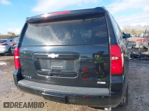 2017 Chevrolet Tahoe LT z VIN 1GNSKBKC4HR115785, wystawiony jako IAAI lot #43473656 z przebiegiem 160 271 mil mil oraz . Historia ofert i sprzedaży dostępna na DreamBid. Obrazek 17.