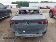 ✅ 2023 Mazda 3 S Carbon Edition • VIN: 3MZBPBCM4PM360102 • Лот: 42470237. Опубликован ранее на IAAI с пробегом Не указан. Бесплатный доступ к архиву аукционных продаж из США и подробный отчёт об истории автомобиля на DreamBid. Изображение 16.