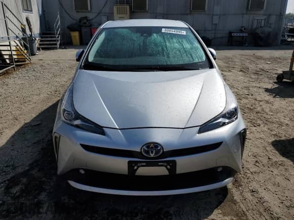 2022 Toyota Prius L Eco с VIN JTDKAMFUXN3188880, выставлен на аукционе Copart как лот 80854995 с пробегом 60 303 миль миль и Списание • Salvage title. История ставок и продаж доступна на DreamBid. Изображение 5.