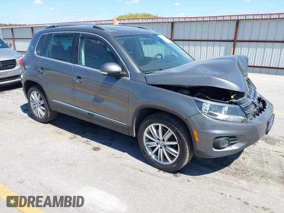 ✅ 2014 Volkswagen Tiguan S • VIN: WVGBV3AXXEW607031 • Lot: 43091792. Listed on IAAI with 139,222 mi. Free auction sales archive from the USA and detailed vehicle history report at DreamBid. Image 1.