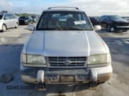 ✅ 1997 Kia Sportage • VIN: KNDJA7235V5538866 • Lot: 79728424. Wystawiony na Copart z przebiegiem 117 230 mil. Bezpłatny archiwum sprzedaży aukcyjnych z USA i szczegółowy raport historii pojazdu na DreamBid. Zdjęcie 5.