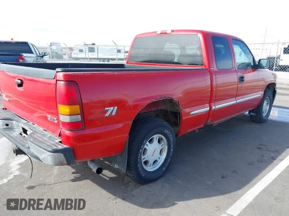 ✅ 1999 GMC Sierra 1500 SLE • VIN: 1GTEK19T8XE502951 • Лот: 41658140. Опубликован ранее на IAAI с пробегом 209 596 миль. Бесплатный доступ к архиву аукционных продаж из США и подробный отчёт об истории автомобиля на DreamBid. Изображение 4.