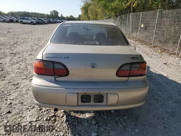 1998 Chevrolet Malibu LS z VIN 1G1NE52M3W6262601, wystawiony jako Copart lot #82218584 z przebiegiem Nie podano mil oraz Szkoda całkowita • Salvage title. Historia ofert i sprzedaży dostępna na DreamBid. Obrazek 6.
