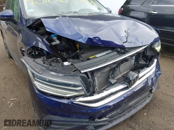 ✅ 2022 Volkswagen Tiguan SE • VIN: 3VV2B7AX3NM043163 • Lot: 43106844. Wystawiony na IAAI z przebiegiem 38 953 mil. Bezpłatny archiwum sprzedaży aukcyjnych z USA i szczegółowy raport historii pojazdu na DreamBid. Zdjęcie 6.