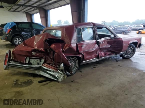 ✅ 1987 Cadillac Brougham • VIN: 1G6DW51Y8H9760303 • Lot: 59555665. Wystawiony na Copart z przebiegiem 34 784 mil. Bezpłatny archiwum sprzedaży aukcyjnych z USA i szczegółowy raport historii pojazdu na DreamBid. Zdjęcie 3.