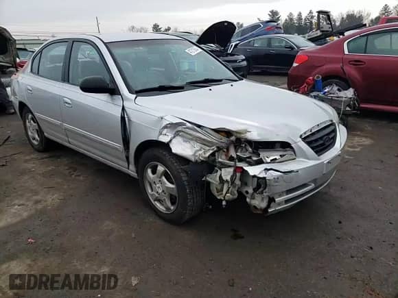 2004 Hyundai Elantra GLS with VIN KMHDN46D74U788645, listed as a Copart auction lot 57315104 with 296,563 mi miles and Salvage title. Bid and sale history available at DreamBid. Image 11.