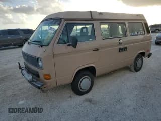 ✅ 1984 Volkswagen Vanagon • VIN: WV2ZB0256EH075158 • Lot: 75388754. Wystawiony na Copart z przebiegiem 210 558 mil. Bezpłatny archiwum sprzedaży aukcyjnych z USA i szczegółowy raport historii pojazdu na DreamBid. Zdjęcie 1.