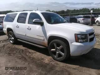 2014 Chevrolet Suburban LT z VIN 1GNSKJE75ER200316, wystawiony jako IAAI lot #42230953 z przebiegiem 167 786 mil mil oraz . Historia ofert i sprzedaży dostępna na DreamBid. Obrazek 1.