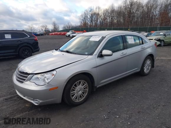 ✅ 2009 Chrysler Sebring Touring • VIN: 1C3LC56B19N534414 • Lot: 43792392. Listed on IAAI with 107,000 mi. Free auction sales archive from the USA and detailed vehicle history report at DreamBid. Image 2.