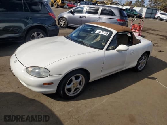✅ 1999 Mazda MX-5 Miata • VIN: JM1NB3539X0136190 • Lot: 82707195. Listed on Copart with 109,300 mi. Free auction sales archive from the USA and detailed vehicle history report at DreamBid. Image 1.