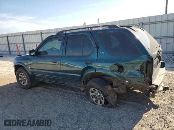 ✅ 1999 Isuzu Rodeo S • VIN: 4S2CK58W6X4351712 • Lot: 49531625. Wystawiony na Copart z przebiegiem 224 115 mil. Bezpłatny archiwum sprzedaży aukcyjnych z USA i szczegółowy raport historii pojazdu na DreamBid. Zdjęcie 2.