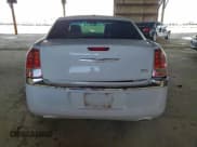 ✅ 2012 Chrysler 300 Limited • VIN: 2C3CCACG7CH180729 • Lot: 94340755. Listed on Copart with 153,723 mi. Free auction sales archive from the USA and detailed vehicle history report at DreamBid. Image 6.