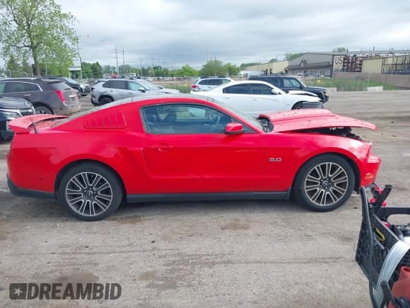 ✅ 2012 Ford Mustang GT Premium • VIN: 1ZVBP8CF0C5225865 • Lot: 42292396. Listed on IAAI with 178,699 mi. Free auction sales archive from the USA and detailed vehicle history report at DreamBid. Image 13.