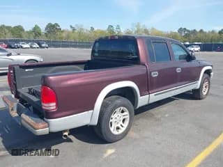✅ 2004 Dodge Dakota SLT • VIN: 1D7HL48N74S586018 • Lot: 41910755. Wystawiony na IAAI z przebiegiem 259 924 mil. Bezpłatny archiwum sprzedaży aukcyjnych z USA i szczegółowy raport historii pojazdu na DreamBid. Zdjęcie 4.