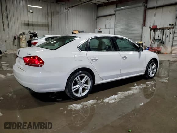✅ 2014 Volkswagen Passat SE • VIN: 1VWBN7A33EC031645 • Lot: 92190255. Listed on Copart with 135,007 mi. Free auction sales archive from the USA and detailed vehicle history report at DreamBid. Image 3.