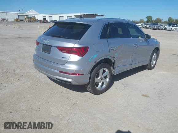 ✅ 2021 Audi Q3 Premium • VIN: WA1AUCF36M1124635 • Lot: 43479778. Listed on IAAI with 73,780 mi. Free auction sales archive from the USA and detailed vehicle history report at DreamBid. Image 4.