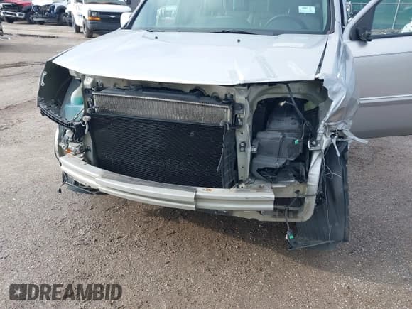 ✅ 2013 Honda Pilot EX-L • VIN: 5FNYF3H76DB013332 • Lot: 41193240. Listed on IAAI with 121,308 mi. Free auction sales archive from the USA and detailed vehicle history report at DreamBid. Image 6.