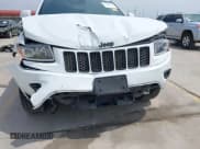 ✅ 2015 Jeep Grand Cherokee Laredo • VIN: 1C4RJEAG7FC104893 • Lot: 43009030. Listed on IAAI with 128,500 mi. Free auction sales archive from the USA and detailed vehicle history report at DreamBid. Image 6.