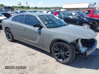 2018 Dodge Charger SXT Plus with VIN 2C3CDXHG1JH167383, listed as a IAAI auction lot 42826149 with 122,871 mi miles and . Bid and sale history available at DreamBid. Image 1.