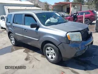 2014 Honda Pilot LX with VIN 5FNYF3H28EB022541, listed as a IAAI auction lot 43011655 with 157,051 mi miles and . Bid and sale history available at DreamBid. Image 1.