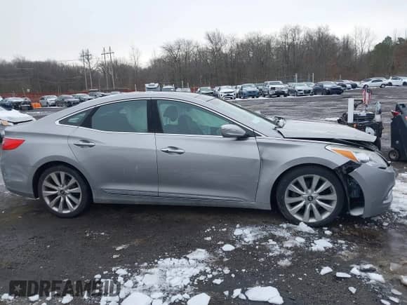 2014 Hyundai Azera Limited with VIN KMHFH4JG6EA361378, listed as a IAAI auction lot 41557210 with 58,561 mi miles and . Bid and sale history available at DreamBid. Image 13.