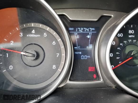 2012 Hyundai Veloster w/Red Int z VIN KMHTC6AD7CU081810, wystawiony jako Copart lot #85392454 z przebiegiem 172 747 mil mil oraz Czysty tytuł • Clean title. Historia ofert i sprzedaży dostępna na DreamBid. Obrazek 9.