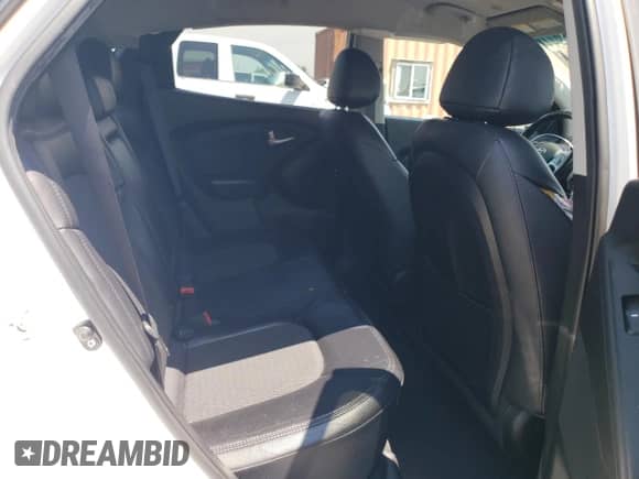 2013 Hyundai Tucson GLS z VIN KM8JU3AC3DU750666, wystawiony jako Copart lot #62409444 z przebiegiem 146 527 mil mil oraz Szkoda całkowita • Salvage title. Historia ofert i sprzedaży dostępna na DreamBid. Obrazek 10.